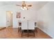 Inviting dining room features a ceiling fan, a charming table, and stylish chairs at 6408 Starcrest Dr, Las Vegas, NV 89108