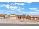 Charming single-story home with a two-car garage and well-maintained landscaping at 6408 Starcrest Dr, Las Vegas, NV 89108