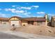 Charming single-story home with a two-car garage and low-maintenance landscaping at 6408 Starcrest Dr, Las Vegas, NV 89108