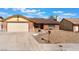 Charming single-story home featuring a two car garage and low maintenance landscaping at 6408 Starcrest Dr, Las Vegas, NV 89108