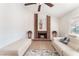 Inviting living room showcasing a brick fireplace and modern furnishings at 6408 Starcrest Dr, Las Vegas, NV 89108