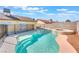 Inviting in-ground pool with walk-in steps and a connected hot tub at 6408 Starcrest Dr, Las Vegas, NV 89108