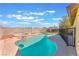 This backyard oasis has a sparkling pool and spa, perfect for entertaining and relaxation at 6408 Starcrest Dr, Las Vegas, NV 89108