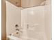 Well-lit shower featuring clean white tiles and modern fixtures at 6816 Royal Poinciana Ct, Las Vegas, NV 89131