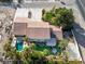 An aerial view of a single Gathering home featuring palm trees and a lush backyard at 788 Rossmore Dr, Las Vegas, NV 89110