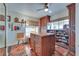 Walk in closet features a central island, a ceiling fan and built in storage for shoes at 788 Rossmore Dr, Las Vegas, NV 89110