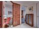 Craft room with built-in storage, shelving, desk, and sewing machine, providing an organized workspace at 788 Rossmore Dr, Las Vegas, NV 89110