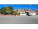 Single-Gathering home with 3-car garage, ample parking, and brick landscaping on a sunny day at 788 Rossmore Dr, Las Vegas, NV 89110