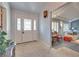 Welcoming foyer features tile flooring and lots of natural light through the front door at 788 Rossmore Dr, Las Vegas, NV 89110