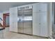 Spacious kitchen featuring stainless steel refrigerator with built-in cabinets at 788 Rossmore Dr, Las Vegas, NV 89110