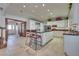 Bright, open kitchen featuring an island with seating and modern appliances at 788 Rossmore Dr, Las Vegas, NV 89110