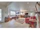 Inviting living room boasts a dining nook, a cozy seating area, and staircase access at 788 Rossmore Dr, Las Vegas, NV 89110