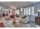Bright living space with wood floors, recessed lighting, and cozy furniture at 788 Rossmore Dr, Las Vegas, NV 89110