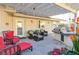 Covered patio includes an outdoor kitchen with a grill and bar area, plus patio furniture at 788 Rossmore Dr, Las Vegas, NV 89110