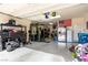 Spacious garage featuring an in-home gym and plenty of room for parking and storage at 7884 Patagonia Point Ct, Las Vegas, NV 89179
