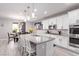 Well-appointed kitchen with an island, granite countertops, and stainless steel appliances at 7884 Patagonia Point Ct, Las Vegas, NV 89179