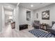 Stylish living room with hardwood floors and neutral color palette at 7884 Patagonia Point Ct, Las Vegas, NV 89179