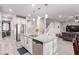 Seamless open-concept living space, connecting kitchen, dining, and living areas at 7884 Patagonia Point Ct, Las Vegas, NV 89179