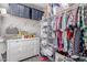 Organized walk-in closet with shelving, drawers, and ample hanging space, maximizing storage solutions at 7884 Patagonia Point Ct, Las Vegas, NV 89179