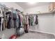 Spacious walk-in closet with built-in shelving and ample storage space for clothes and accessories at 7884 Patagonia Point Ct, Las Vegas, NV 89179