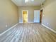 Bright bedroom features wood floors and neutral walls at 8250 N Grand Canyon Dr # 1139, Las Vegas, NV 89166