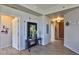 Bright hallway with tile floors, modern decor, and a stylish table with a mirror, creating an inviting entry space at 8255 Las Vegas Blvd # 313, Las Vegas, NV 89123