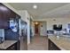 Contemporary kitchen with stainless steel refrigerator, granite countertops, and convenient breakfast bar at 8255 Las Vegas Blvd # 313, Las Vegas, NV 89123