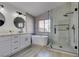 Beautiful bathroom with soaker tub, glass shower, and double vanity at 9808 Eagle Rock Ct, Las Vegas, NV 89117