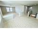 Bright hallway with wood flooring, painted walls, and a view of stairs at 9876 Parador Cellars Ct, Las Vegas, NV 89141