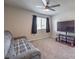 Cozy living room with carpet, ceiling fan, TV, and comfortable seating at 9876 Parador Cellars Ct, Las Vegas, NV 89141