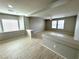 Inviting living room with tile floors, painted walls, and lots of light at 9876 Parador Cellars Ct, Las Vegas, NV 89141