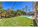 Lush backyard with a well-maintained lawn, ideal for outdoor activities and relaxation at 10662 Bonchester Hill St, Las Vegas, NV 89141
