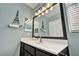 Clean and bright bathroom boasts an elegant vanity, modern fixtures, and an appealing overall design at 10662 Bonchester Hill St, Las Vegas, NV 89141