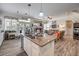 Spacious kitchen seamlessly connecting to the living room, ideal for entertaining and everyday living at 10662 Bonchester Hill St, Las Vegas, NV 89141