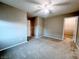 Carpeted bedroom featuring neutral colors and a walk-in closet at 10941 Prudhoe Bay St, Las Vegas, NV 89179