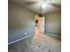 Neutral bedroom featuring carpeted floors and a ceiling fan at 10941 Prudhoe Bay St, Las Vegas, NV 89179