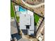 Aerial view of a modern home showing the roof, patio, pool, and pristine landscaping in a desert community at 11943 Rockview Point St, Las Vegas, NV 89138