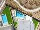 Aerial view of modern backyard with pool and green turf accenting a desert landscape at 11943 Rockview Point St, Las Vegas, NV 89138