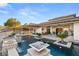 Gorgeous backyard with a sparkling pool, elegant water features, and a covered patio for seamless indoor-outdoor living at 12 Wade Hampton Trl, Henderson, NV 89052