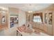 Cozy dining area featuring built in cabinets and a decorative chandelier at 1299 Brenalee Ave, Henderson, NV 89002