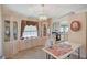 Dining area with built-in cabinetry and a chandelier at 1299 Brenalee Ave, Henderson, NV 89002