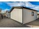 Home exterior featuring a gravel yard and blue skies at 1299 Brenalee Ave, Henderson, NV 89002