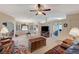 Bright and open living room with views into dining area and kitchen at 1299 Brenalee Ave, Henderson, NV 89002