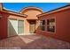 View of entry courtyard and front door at 1455 Waterfall Ln, Mesquite, NV 89034