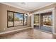 Dining room with a sliding door and a large window that provides lots of natural light at 1455 Waterfall Ln, Mesquite, NV 89034