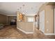 Open-concept living area with tile flooring, recessed lighting, and stainless steel appliances at 1455 Waterfall Ln, Mesquite, NV 89034