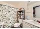 Bathroom featuring a shower, single sink vanity, white paint, and a cactus shower curtain at 1830 N Pecos Rd # 137, Las Vegas, NV 89115