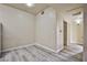 Small room with wood-look floors and neutral walls at 2131 Hussium Hills St # 104, Las Vegas, NV 89108