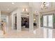 Spacious foyer boasting an elegant chandelier, open floor plan, and sophisticated design at 2285 Villefort Ct, Las Vegas, NV 89117