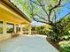 Enjoy outdoor living on the back patio with views of the lush landscaping at 2357 Wisconsin Dells Dr, Henderson, NV 89044